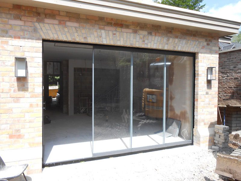 Cheshire 4-panel frameless bifolds