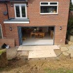 Grey frameless doors to new extension