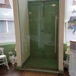 Internal shop frameless porch door