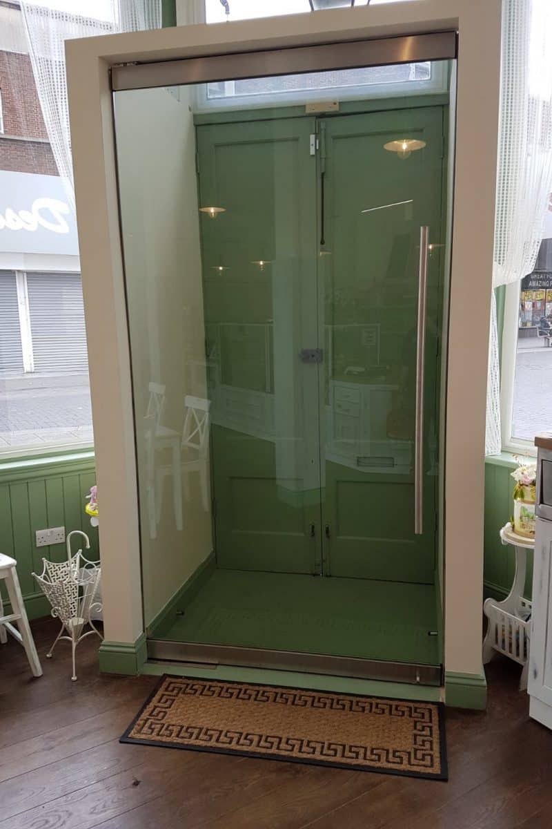 Internal shop frameless porch door