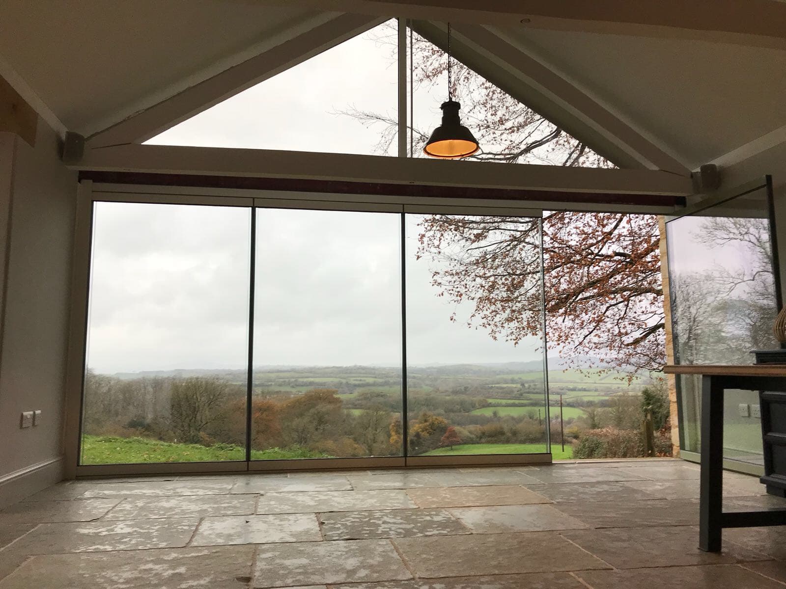 Beaminster Frameless doors & gable window | Frameless Glass Bi Fold ...