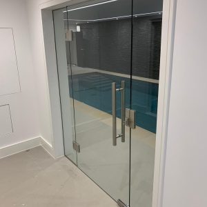 Swimming pool internal glass doors