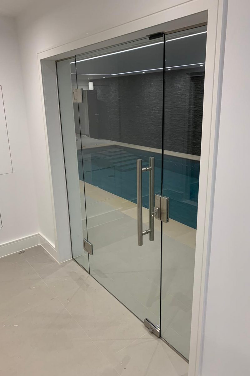 Swimming pool internal glass doors