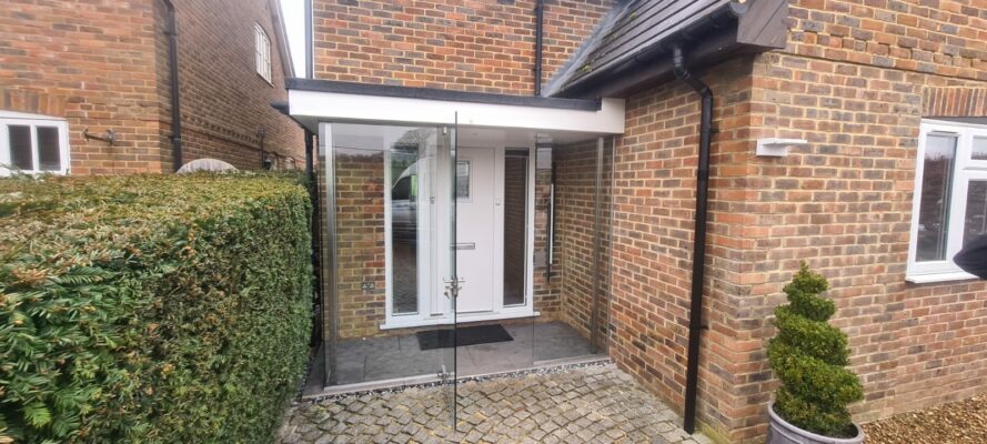 frameless glass porch in hampshire to a suburban house