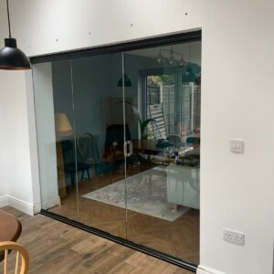 black single glazed room dividers in a house renovation.